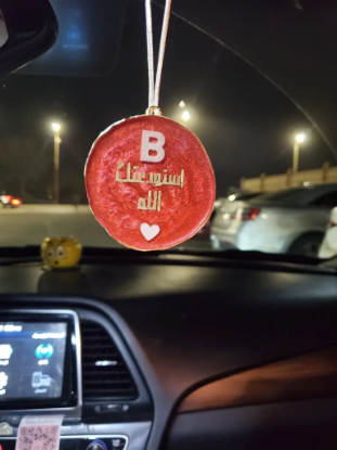 Picture of Car pendant with letter and phrase (I entrust you to God)