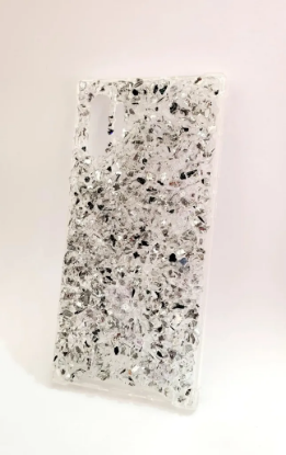 Picture of A mobile cover with a shiny crystal sand design